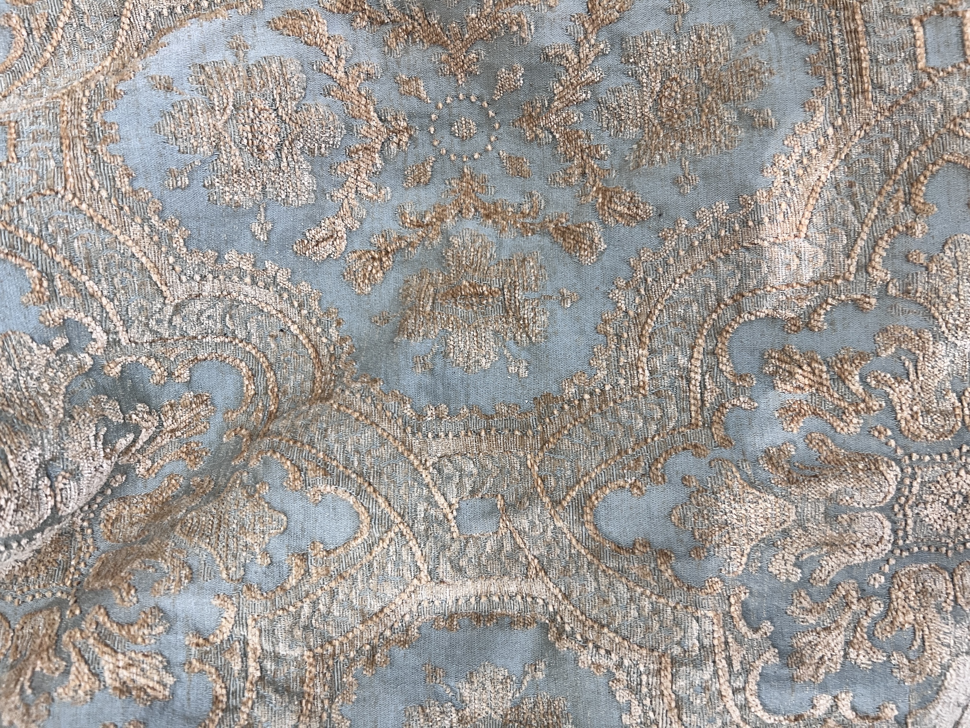 A turquoise and gold damask door curtain, approx. width 280cm, height 230cm